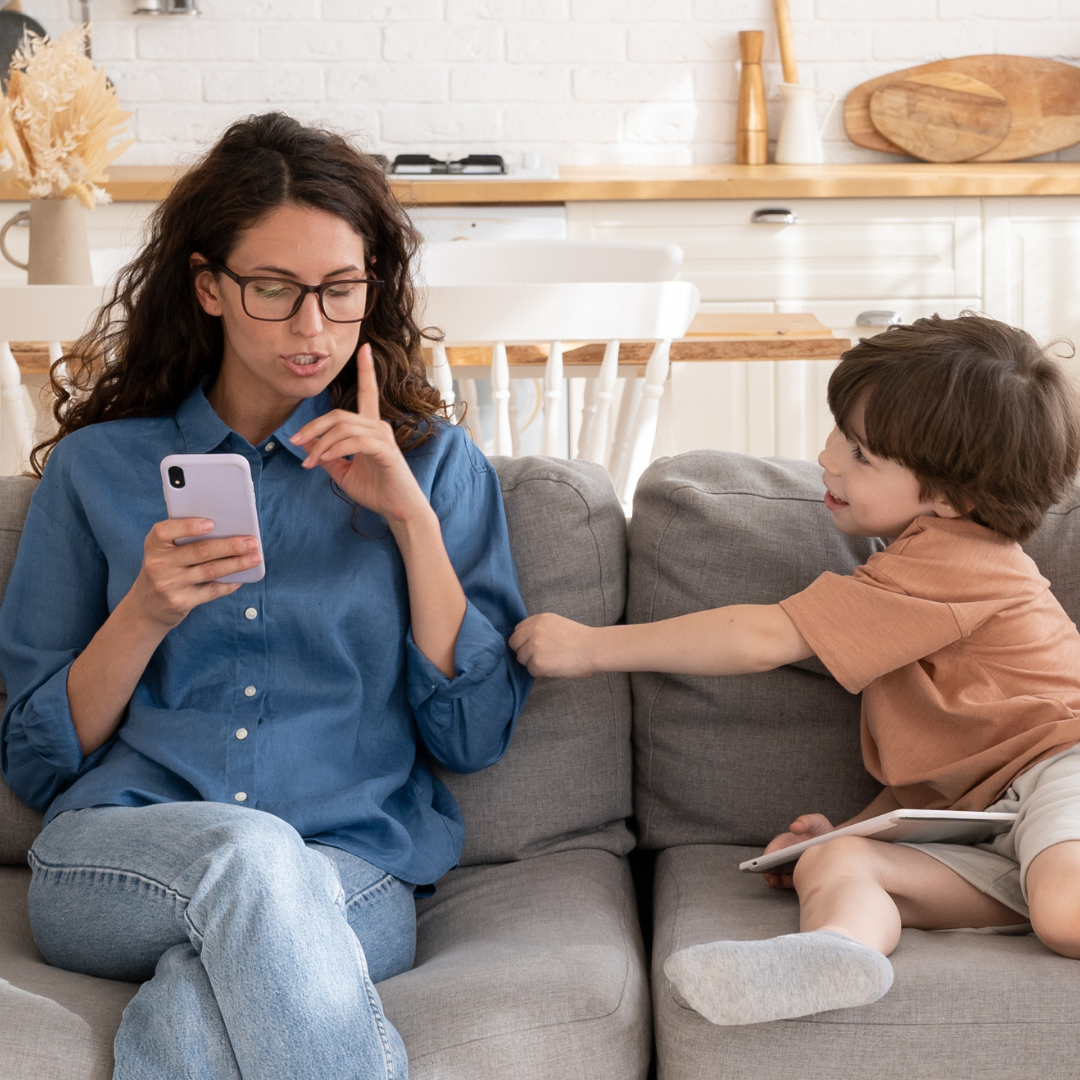 Mom looking at social media, comparing her homeschool, and becoming overwhelmed